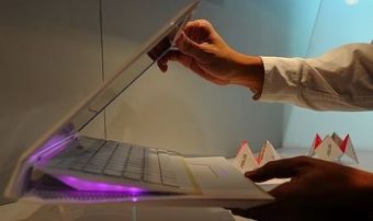 Asus выпустит супертонкий ноутбук со сдвигающейся клавиатурой